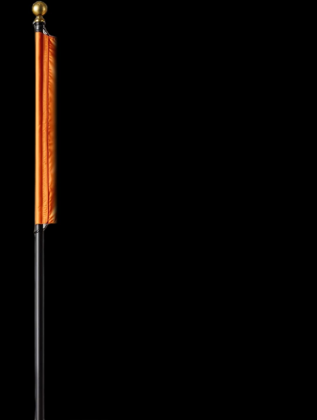 A terracotta satin flag flying from an iron staff planted in dark cracked ground.